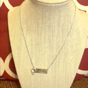 Hand cut, stamped, filed, sterling silver bar neck